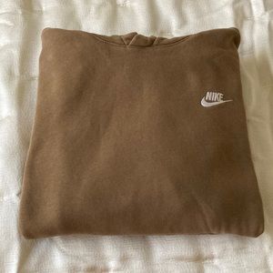 Good Condition M Nike Hoodie. Pouch in front, with drawstring hood.